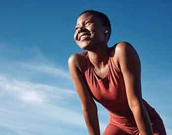 Lady smiles outdoors
