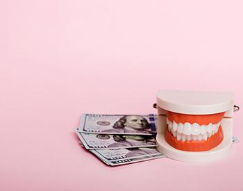 Fake teeth and money