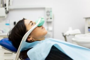Woman getting nitrous oxide for her dental visit