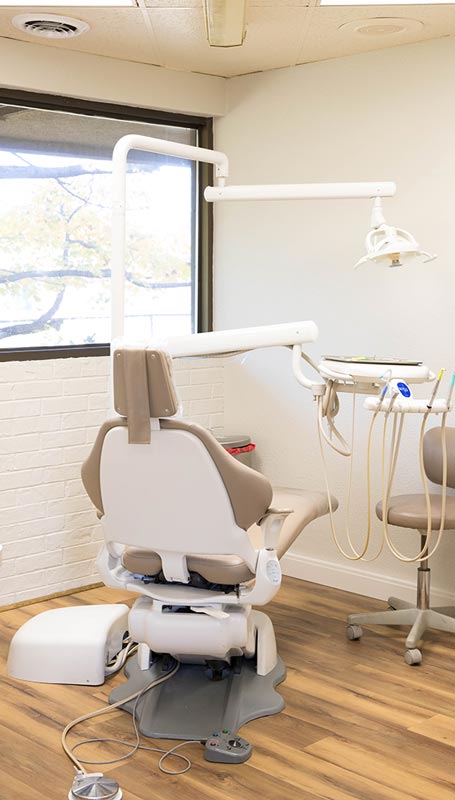 A dental chair in an operatory